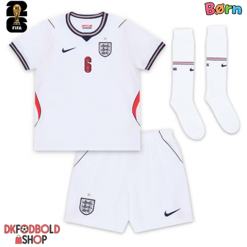 England Marc Guehi #6 Hjemmebanesæt Børn VM 2026 Kort ærmer (+ korte bukser)